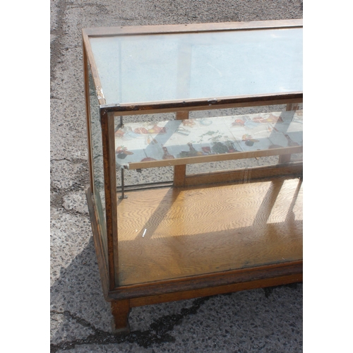 153 - Large antique wooden & glazed shop display unit with interior shelf and sliding doors, approx 179cm ... 