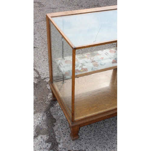 154 - Large antique wooden & glazed shop display unit with interior shelf and sliding doors, approx 179cm ... 