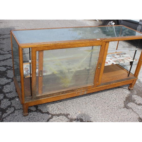 154 - Large antique wooden & glazed shop display unit with interior shelf and sliding doors, approx 179cm ... 