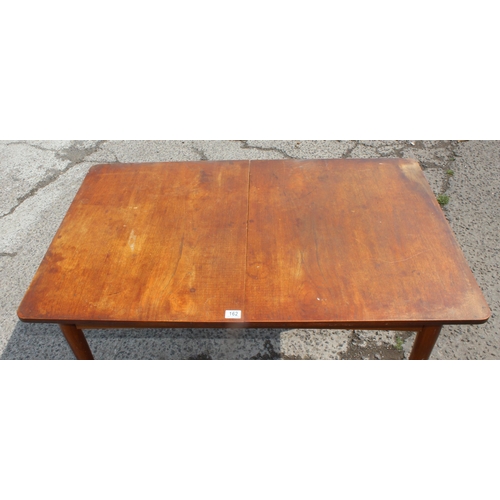 162 - Extending Austinsuite kitchen/dining table with central leaf, approx 163cm x 73cm x 76cm