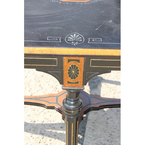 54 - A late Victorian or Edwardian ebonised and amboyna octagonal library or centre table with inlay, app... 