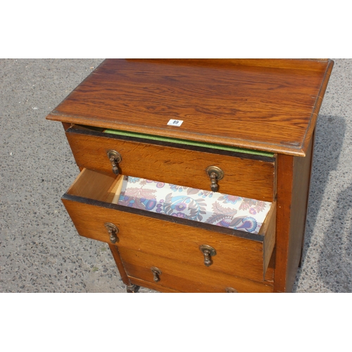 89 - Art Deco period oak 4 drawer chest of drawers with drop handles, approx 77cm wide x 100cm tall x 47c... 