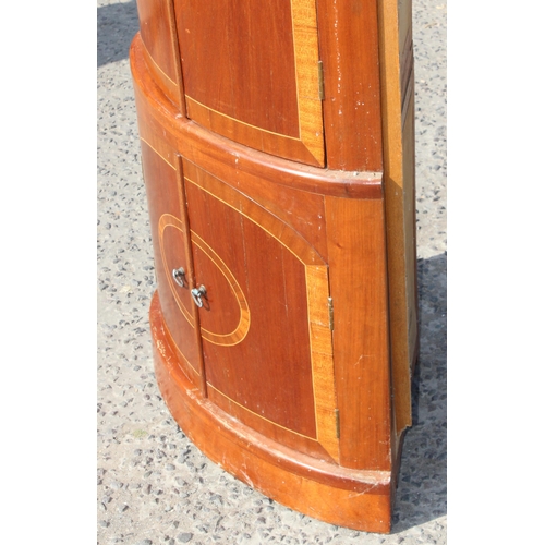 90 - A vintage mahogany floor standing cupboard with Sheraton style inlay comes with original invoice fro... 