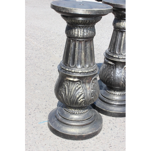 93 - In the manner of J.J. Ducel of Paris, a large pair of bronze patinated cast iron columns or pedestal... 