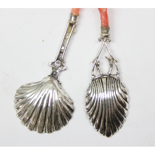 1049 - 2 Italian 800 silver and coral handled spoons, one for Parmesan and the other for sugar, both with b... 