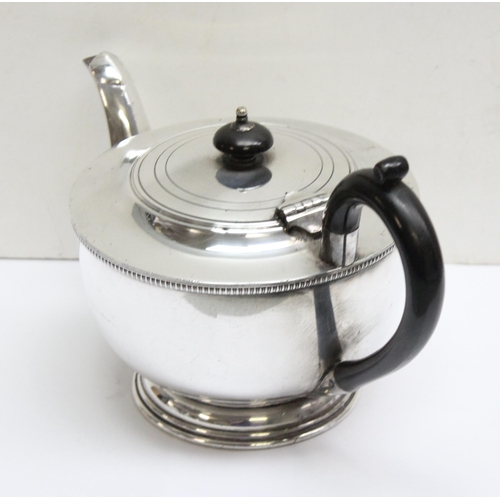 1055 - Silver plated 4 piece coffee and tea set comprising a coffee pot, sugar and cream by Viners of Sheff... 