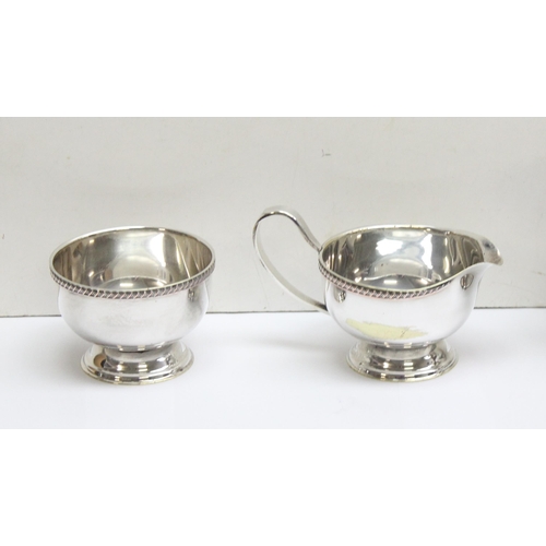 1055 - Silver plated 4 piece coffee and tea set comprising a coffee pot, sugar and cream by Viners of Sheff... 