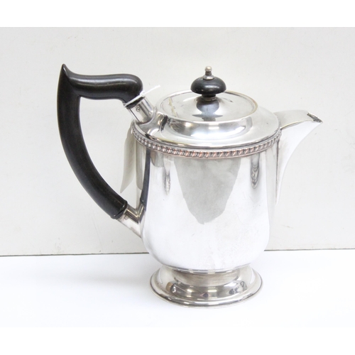 1055 - Silver plated 4 piece coffee and tea set comprising a coffee pot, sugar and cream by Viners of Sheff... 