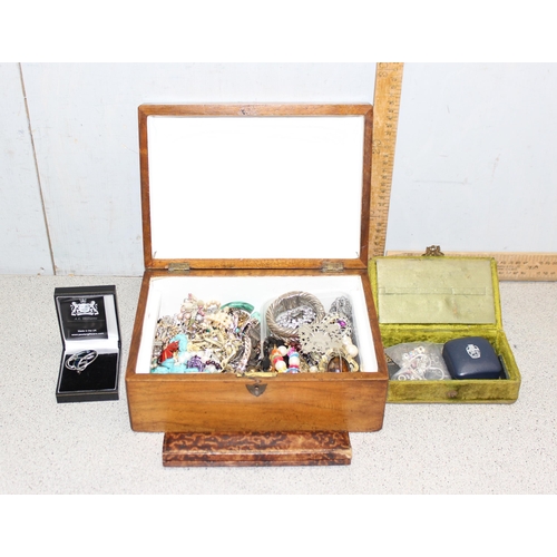 1113 - An antique wooden box containing a large qty of assorted costume jewellery, some silver items, appro... 