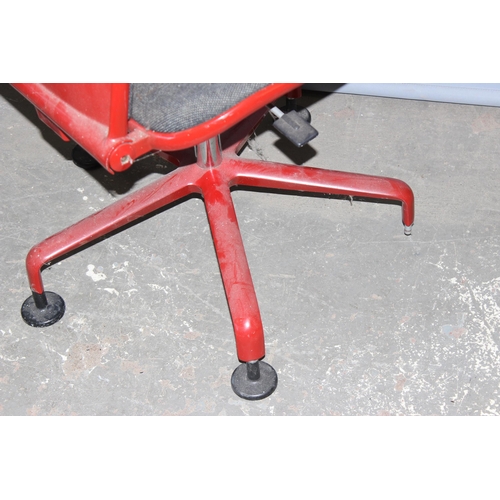 72 - 2 retro Hille Supporto metal desk chairs, designed by Fred Scott, bearing label for 1982, red one mi... 