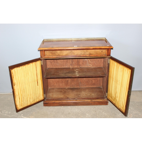 75 - A 19th century mahogany hall cupboard or small sideboard with brass gallery top over a concealed dra... 