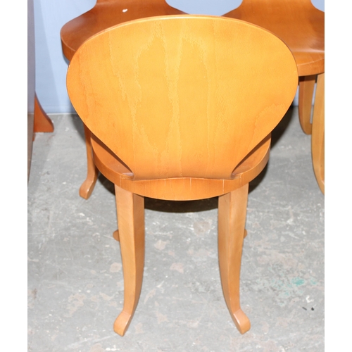 76 - A retro style dropleaf table and a set of 6 unusual bentwood chairs. seemingly unmarked, the table w... 