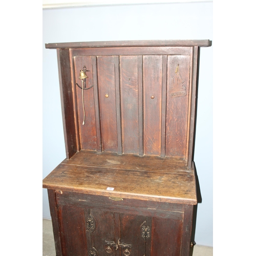 80 - An unusual vintage oak display dresser with side doors, mounted with brass bell etc, approx 98cm wid... 