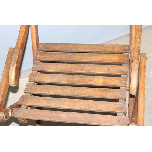 73 - A 19th century folding mahogany campaign chair