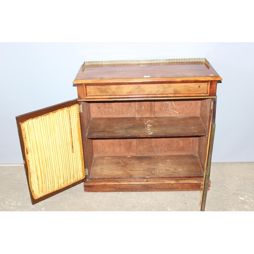 75 - A 19th century mahogany hall cupboard or small sideboard with brass gallery top over a concealed dra... 