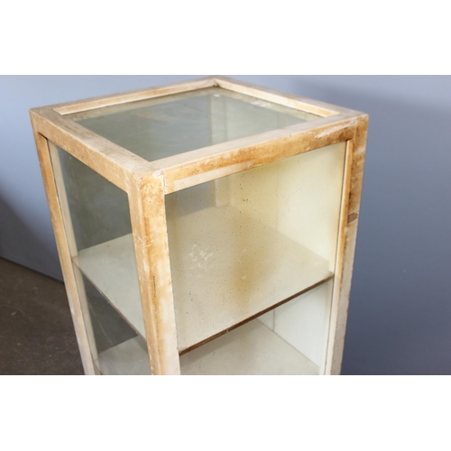 83 - A vintage white painted glazed shop display cabinet with 3 glazed sides and 2 rear doors, approx 53c... 