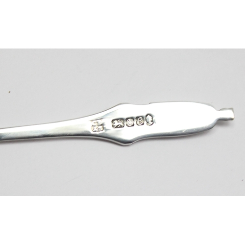 1058 - A solid silver Queen Elizabeth II silver letter opener, Sheffield 1977 by Cooper Brothers & Sons Ltd... 