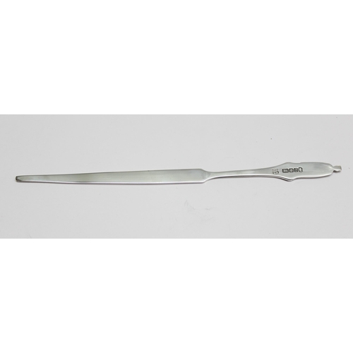 1058 - A solid silver Queen Elizabeth II silver letter opener, Sheffield 1977 by Cooper Brothers & Sons Ltd... 