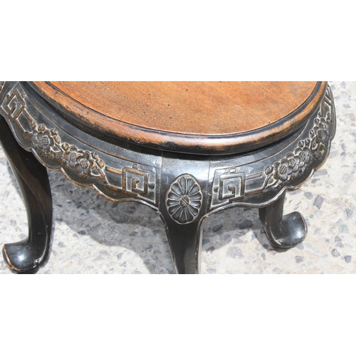 47 - An unusual small carved wooden jardiniere stand or side table with oval top, likely Chinese, c.1900,... 