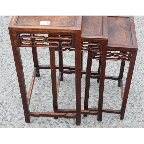 46 - An early 20th century Chinese hardwood nest of 3 tables, the largest approx 37cm wide x 60cm tall