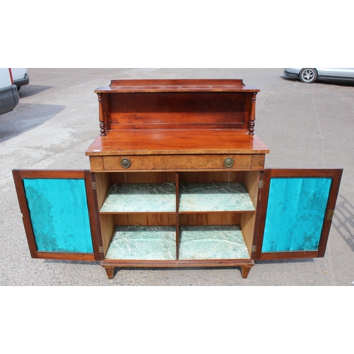 34 - A 19th century mahogany hall cupboard or small sideboard with a single drawer over 2 cupboard doors ... 