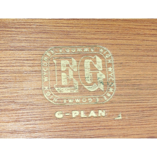 23 - A retro green painted G-Plan 7 drawer chest of drawers. approx 66cm wide x 134cm tall x 40cm deep