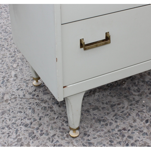 23 - A retro green painted G-Plan 7 drawer chest of drawers. approx 66cm wide x 134cm tall x 40cm deep