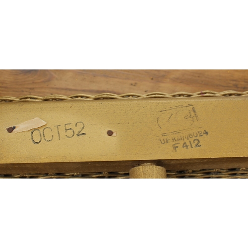 112 - A Lloyd Loom style utility furniture chair, label missing, gold finish with upholstered seat