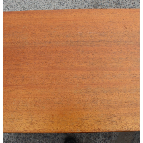 55A - A retro A.H. McIntosh of Kirkcaldy teak sideboard, with three central short drawers, the top drawer ... 