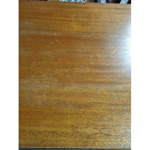 55A - A retro A.H. McIntosh of Kirkcaldy teak sideboard, with three central short drawers, the top drawer ... 