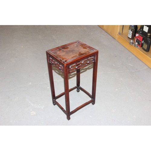 46 - An early 20th century Chinese hardwood nest of 3 tables, the largest approx 37cm wide x 60cm tall