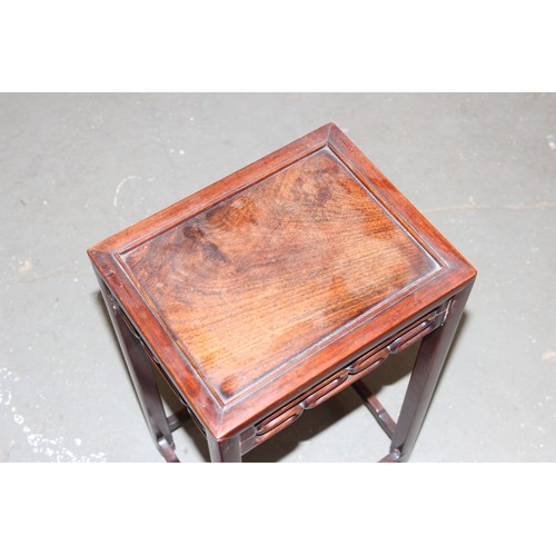 46 - An early 20th century Chinese hardwood nest of 3 tables, the largest approx 37cm wide x 60cm tall