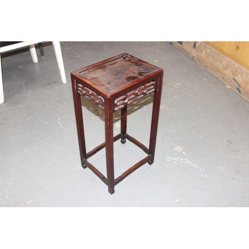 46 - An early 20th century Chinese hardwood nest of 3 tables, the largest approx 37cm wide x 60cm tall