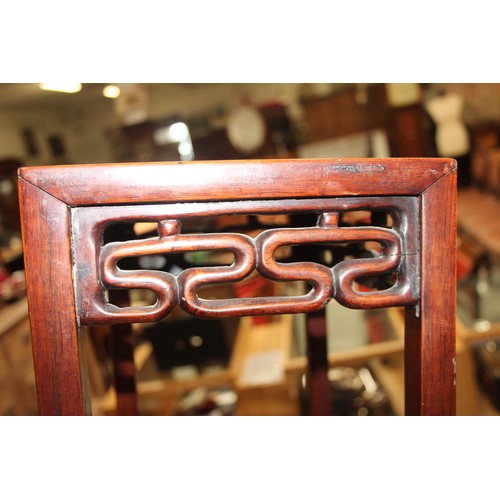 46 - An early 20th century Chinese hardwood nest of 3 tables, the largest approx 37cm wide x 60cm tall