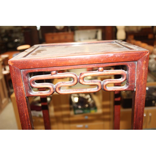 46 - An early 20th century Chinese hardwood nest of 3 tables, the largest approx 37cm wide x 60cm tall