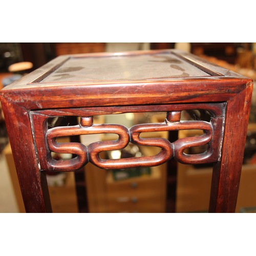 46 - An early 20th century Chinese hardwood nest of 3 tables, the largest approx 37cm wide x 60cm tall