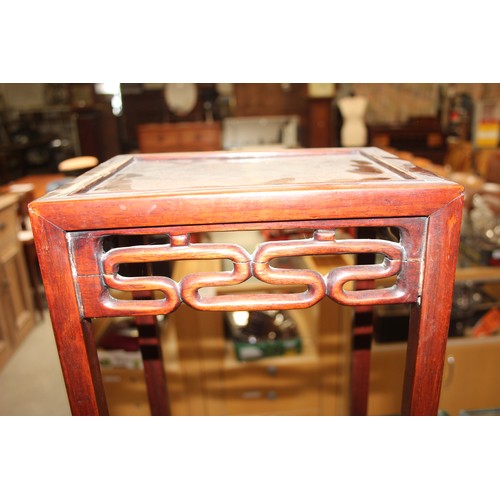 46 - An early 20th century Chinese hardwood nest of 3 tables, the largest approx 37cm wide x 60cm tall