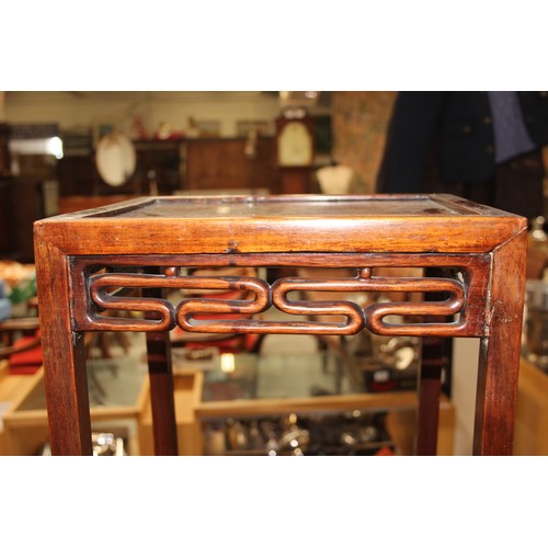 46 - An early 20th century Chinese hardwood nest of 3 tables, the largest approx 37cm wide x 60cm tall