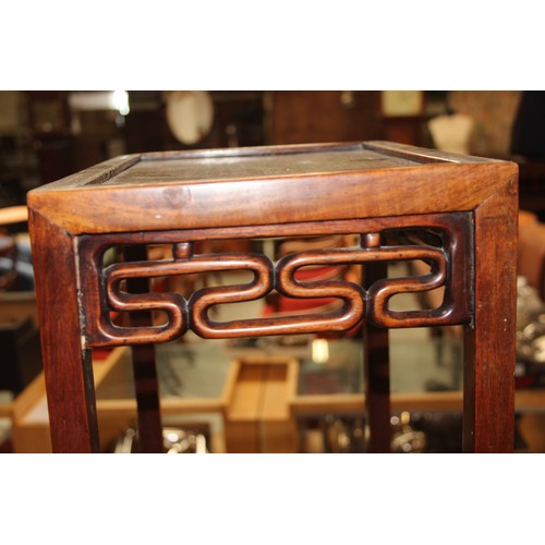 46 - An early 20th century Chinese hardwood nest of 3 tables, the largest approx 37cm wide x 60cm tall