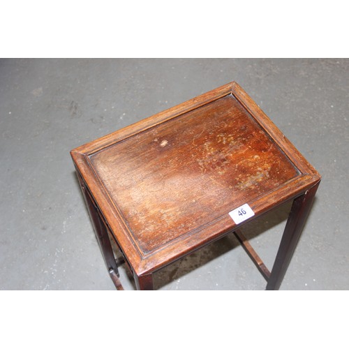 46 - An early 20th century Chinese hardwood nest of 3 tables, the largest approx 37cm wide x 60cm tall
