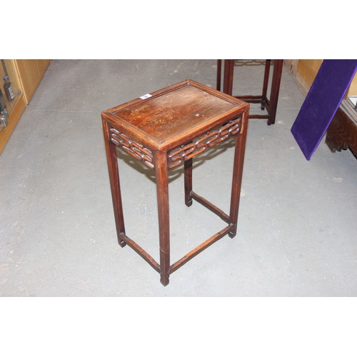 46 - An early 20th century Chinese hardwood nest of 3 tables, the largest approx 37cm wide x 60cm tall