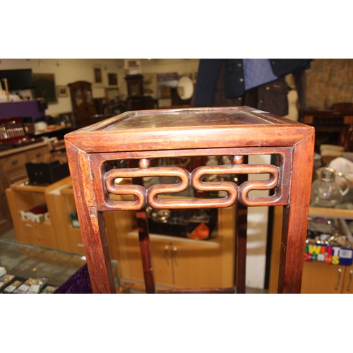 46 - An early 20th century Chinese hardwood nest of 3 tables, the largest approx 37cm wide x 60cm tall