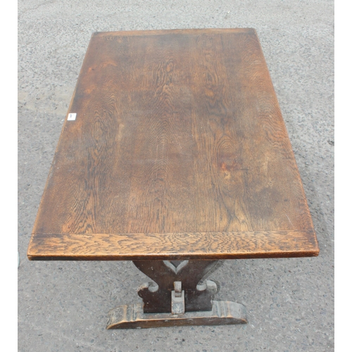 6 - An early 20th century oak topped refectory table, approx 122cm x 71cm