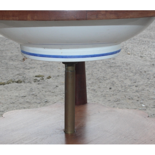 14 - An antique mahogany wash stand with blue & white pottery bowl, approx 79cm tall x 50cm in diameter