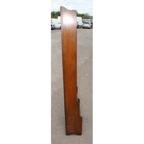 24 - A tall vintage mahogany waterfall bookcase, approx 178cm tall x 47cm wide