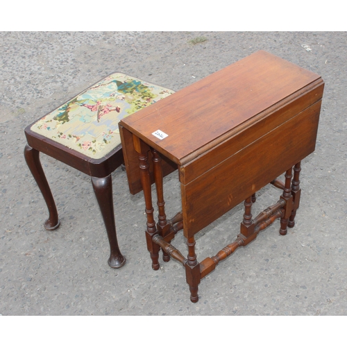 30 - A small antique mahogany Sutherland table with turned legs and a mahogany stool with Pheasant tapest... 