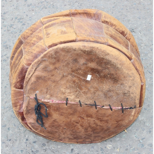 28 - A retro tan leather pouffe or foot stool