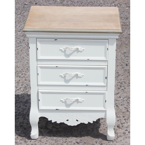 74 - A white painted hall table with 2 drawers and a similar painted bedside cabinet, the table approx 90... 