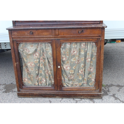 22 - An unusual antique oak display cabinet with 2 pairs of glazed doors and 2 slim drawers, approx 143cm... 