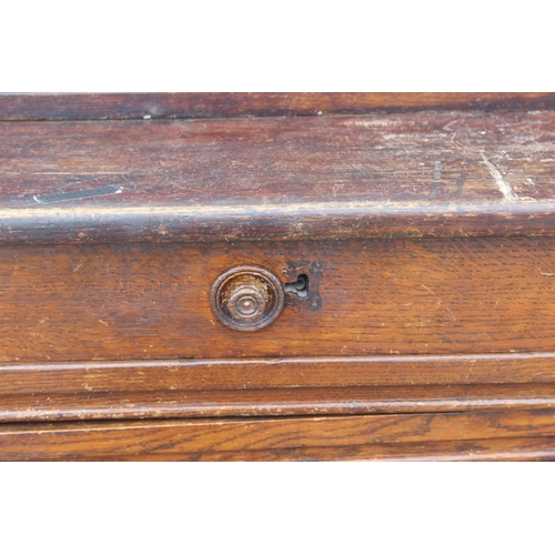 22 - An unusual antique oak display cabinet with 2 pairs of glazed doors and 2 slim drawers, approx 143cm... 